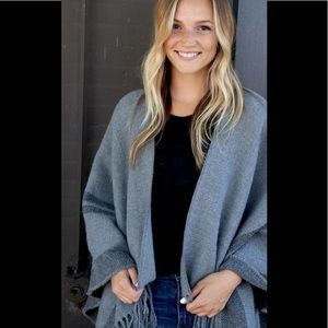 Lightweight knit poncho/shawl with fringe!